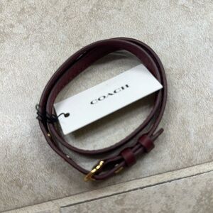Coach red leather bracelet